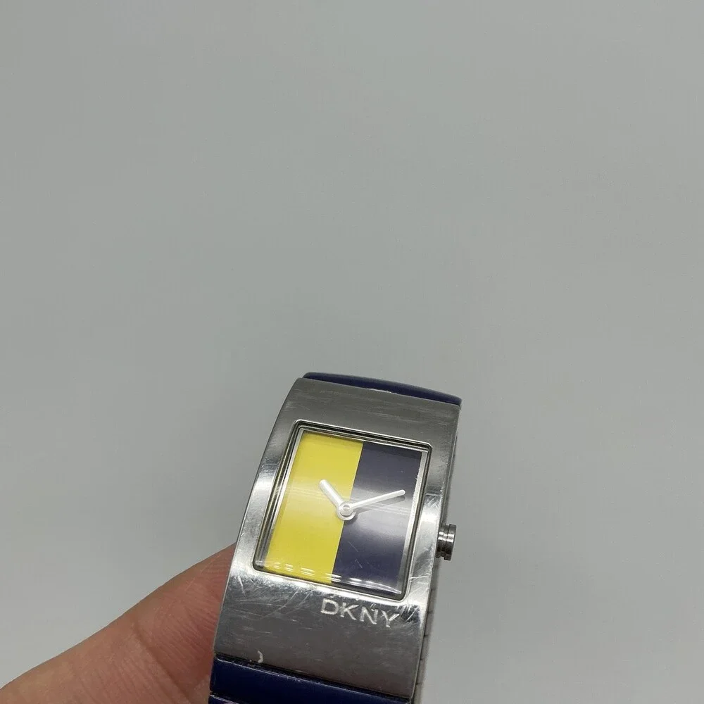 DKNY Womens Watch 19mm Silver Tone Multicolor Dial Blue Stretch Band New Battery